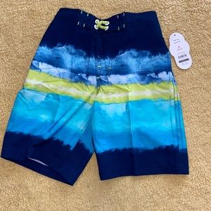 Wonder Nation boys swim trunks, size 6-7.  Blue multi colored.